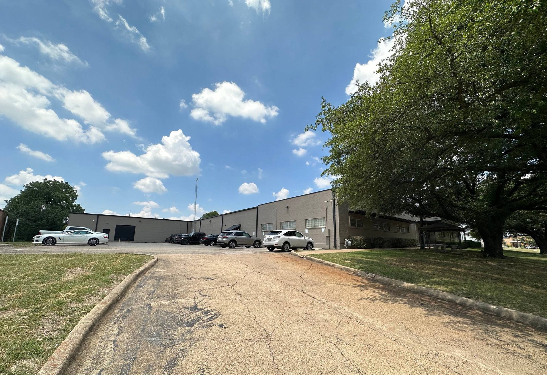 8717 Directors Row — front exterior and parking