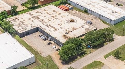 8717 Directors Row — aerial view of building and site