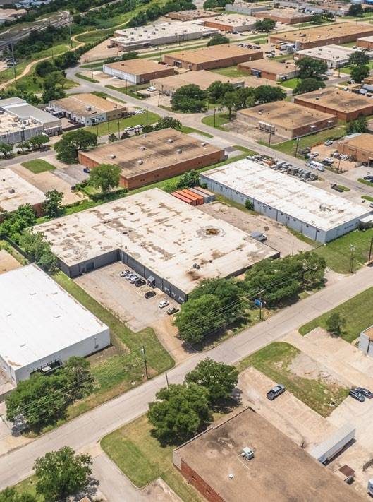 8717 Directors Row — oblique aerial, building and surrounding area